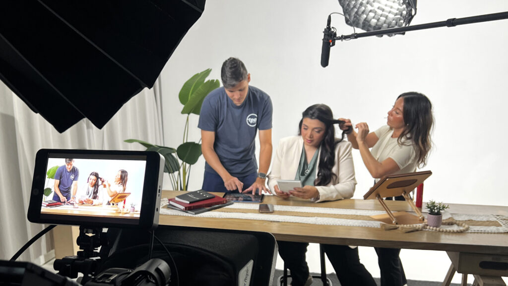 Professional studio video production setup with lighting and backdrop
